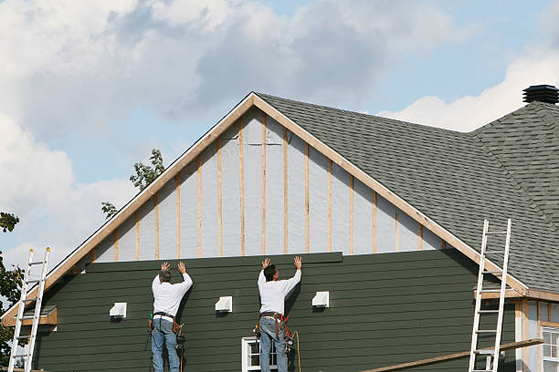 Professional Emergency Siding Repair technician working in McHenry, IL